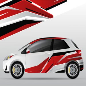 Bijeli automobil oslikan crvenim i crnim grafičkim motivima